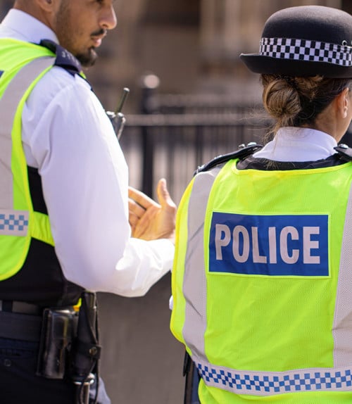 Two police officers in the street