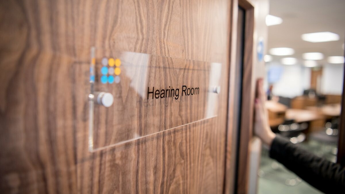 Door with Hearing Room on the sign