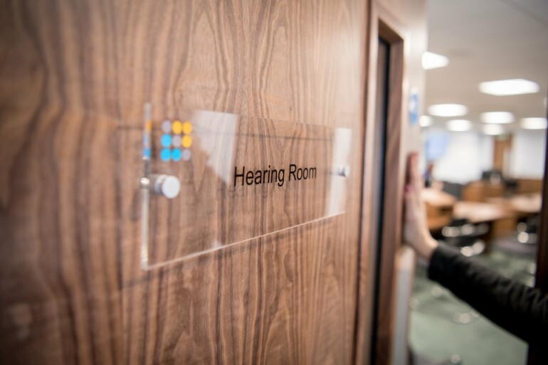 Door with Hearing Room on the sign