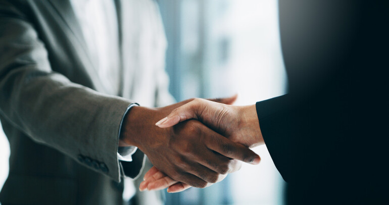 Two people shaking hands